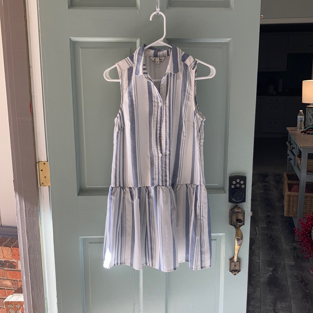 Blue and white striped peplum hem dress